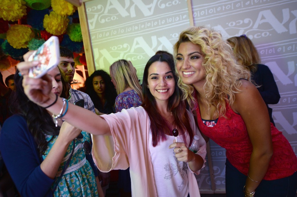 Tori Kelly posing for pics with a Fan ARIZONA JEAN CO Hosts VIP Event In Brooklyn With Tori Kelly And Alex & Sierra